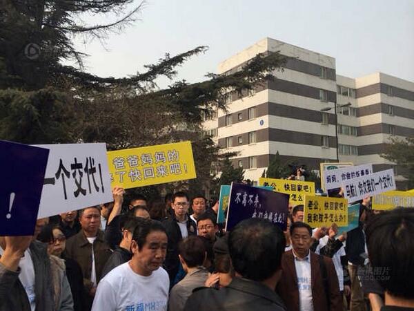 Family members of MH370 victims protest at Malaysia embassy in Beijing