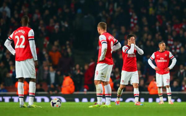 ESPNFC's tweet photo. FT: An own goal dooms Arsenal against Swansea and potentially in the title race as they draw 2-2. http://t.co/xwTnS0tuCy