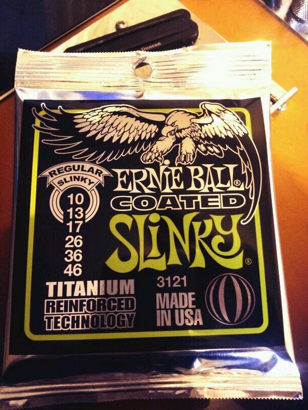 PursuitOfficial's tweet photo. Today's choice of strings #slinky @ernieball http://t.co/oIAAaWszXi