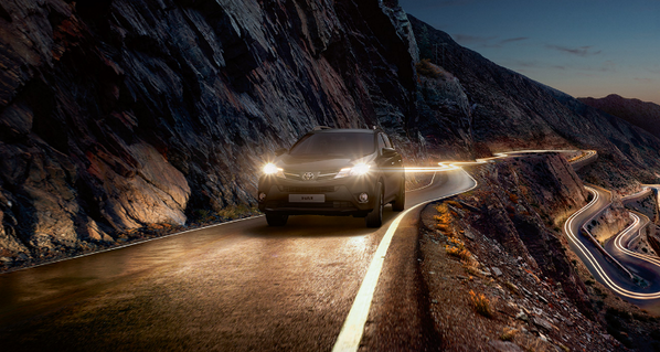 Here she is, the new #RAV4 tackling the kind of roads she loves best and making full use of the dusk sensing lamps