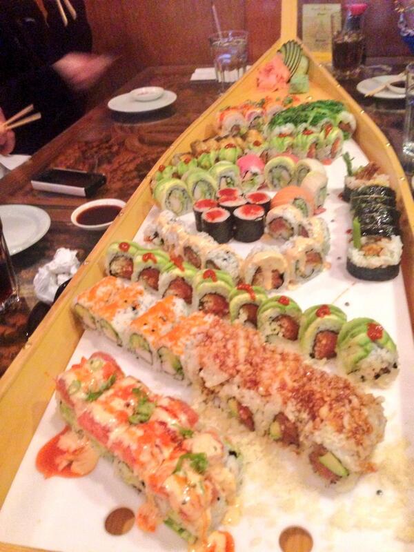 CapstratPA's tweet photo. All aboard! This is how @CapstratPA does birthday lunch. #sushiboat #tradition http://t.co/bk18eYE1Sa