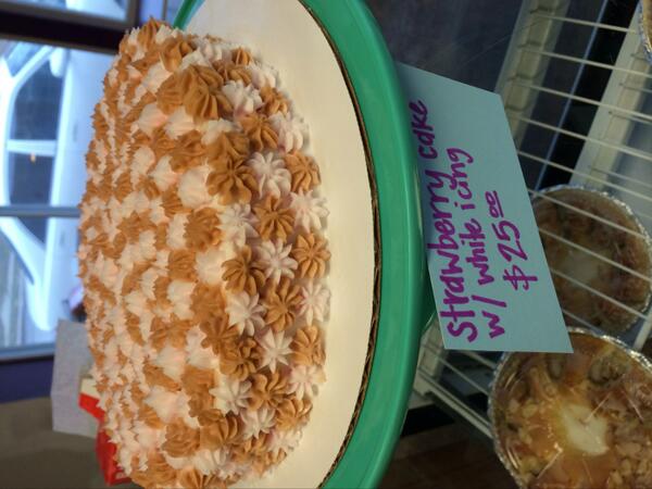 First person to retweet and come to <a href="/McLainsBakery/">McLain's Bakery</a> (201 Gregory) gets this cake for free! Strawberry cake/white icing