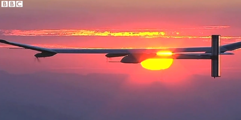 Swiss team unveils Solar Impulse 2 plane for sun-powered flight around globe bbc.in/1gbaeXo