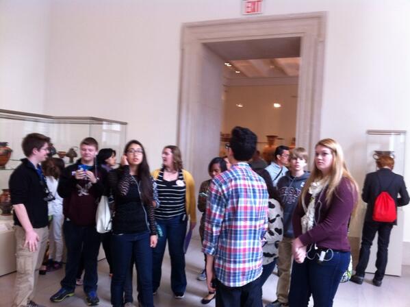 Mrs. Hillis is doing a great job explaining the art exhibits. She is helping to make connections from the classroom.