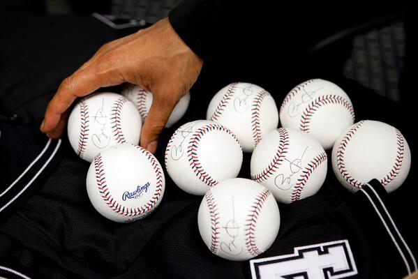 Obama now signing baseballs for Opening Day