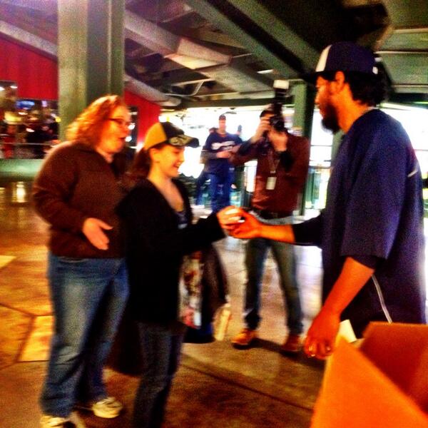 Brewers's tweet photo. Yo surprises fans this evening, handing out autographed items & tix before tonight's game. #BrewersFansFirst http://t.co/gRs22RD0Pd