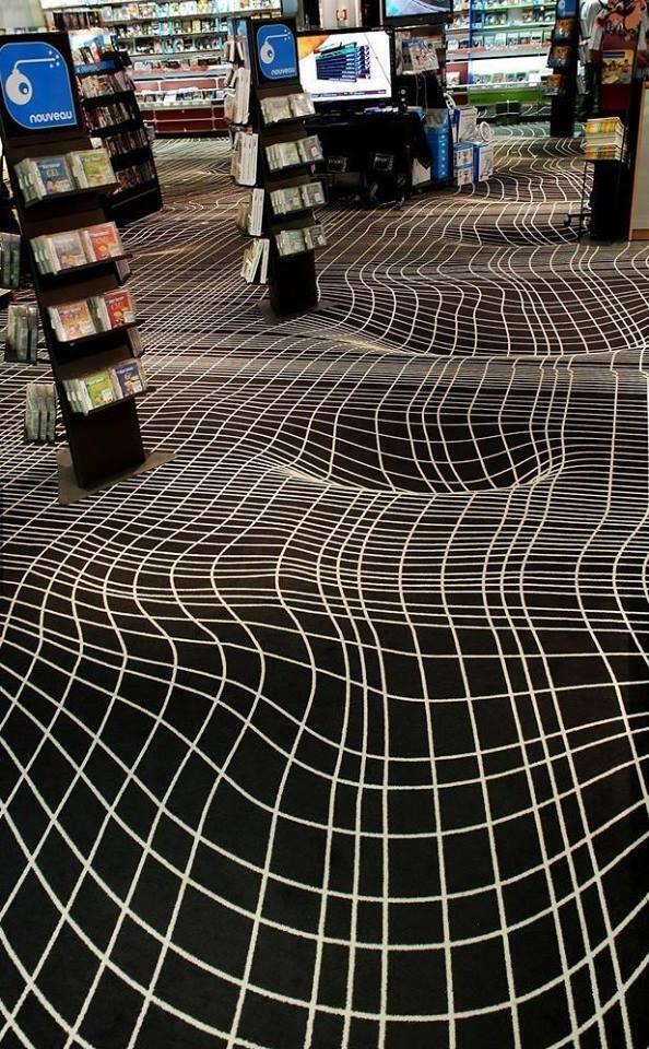 NotCorruptMedia's tweet photo. Looking for a cool carpet design? Try this one! The ground is actually flat. http://t.co/9rkHuMxjOU