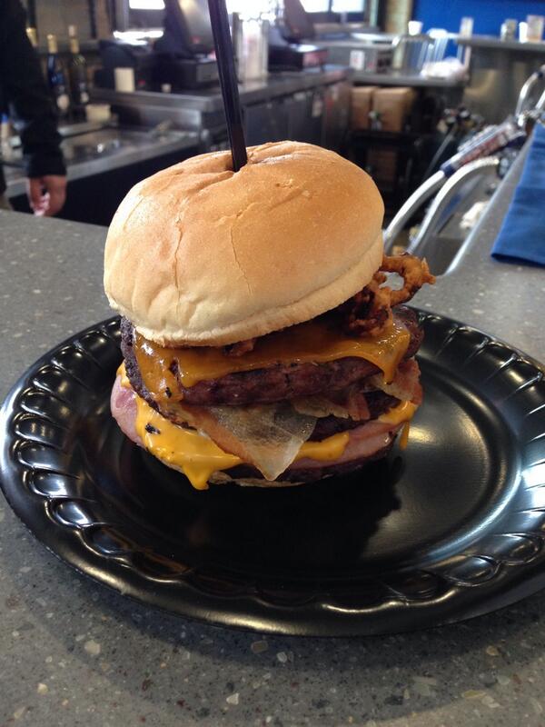 darrenrovell's tweet photo. The @OMAStormChasers’ “The Champ” (1 lb of Omaha Steaks patties, bacon, ham, Swiss, American, Cheddar &amp; onion strings http://t.co/7Dhl0V0iiR
