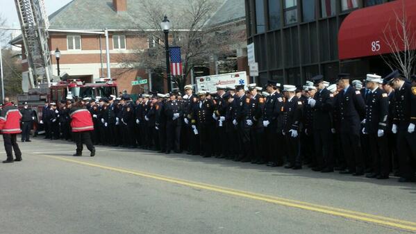 WatertownMANews's tweet image. The line of #firefighters, several rows deep, stretches from CVS to St Pat's Church for #LtWalsh. #Watertown