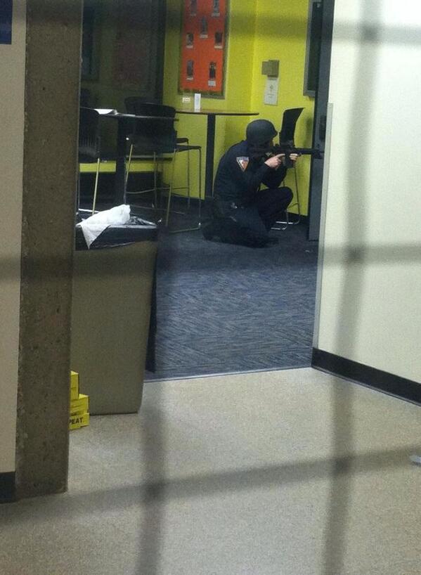 BREAKING: Armed authority inside Business  Administration building. Taken on location.