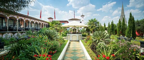 Virgin's tweet image. Can you guess which Virgin company has a beehive and wormery on its roof? virg.in/cAMPn