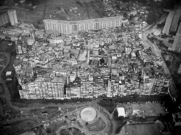 WSJ's tweet image. Watch this @WSJAsia documentary about Hong Kong&apos;s Kowloon Walled City: on.wsj.com/1kwYEW8 (HKCEDD)