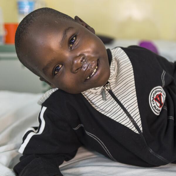Smiletrain's tweet photo. Meet Osawa of Tanzania, our 1MMth smile. Donate to bring smiles to more like him #SmileyGraph http://t.co/KloxHCH2r5 http://t.co/AM76xSrg8Q