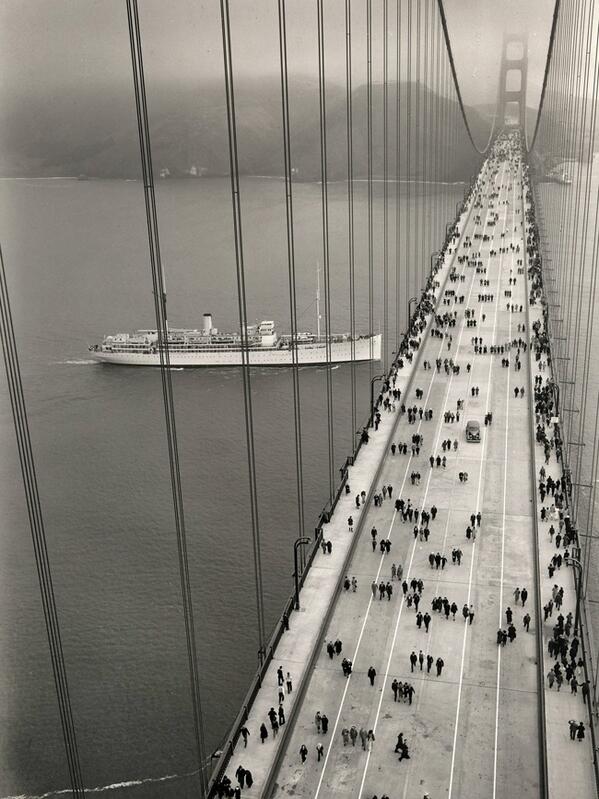 HistoryInPics's tweet photo. Golden Gate bridge - opening day. 1937. http://t.co/Lw1iZXdF6H