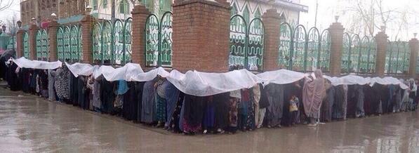 Amazing!!! “<a href="/MalaliBashir/">Malali Bashir</a>: Yes, we can! Heavy rain couldn't stop these women from voting. #AfgElection2014 ””