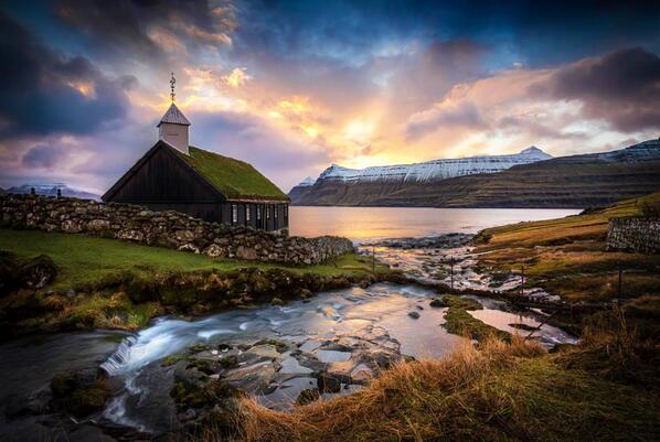 Sunrise Over Church On The Faroe Islands. By Marc Perrella.