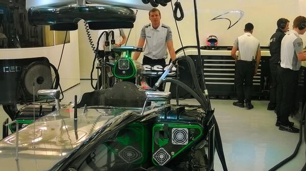McLarenF1's tweet photo. Pre #BahrainGP race prep in the garage: the #Mobil1Insider snaps the #MP429 getting a fill-up with Esso fuel. #F1 http://t.co/iIvY6gU2t3