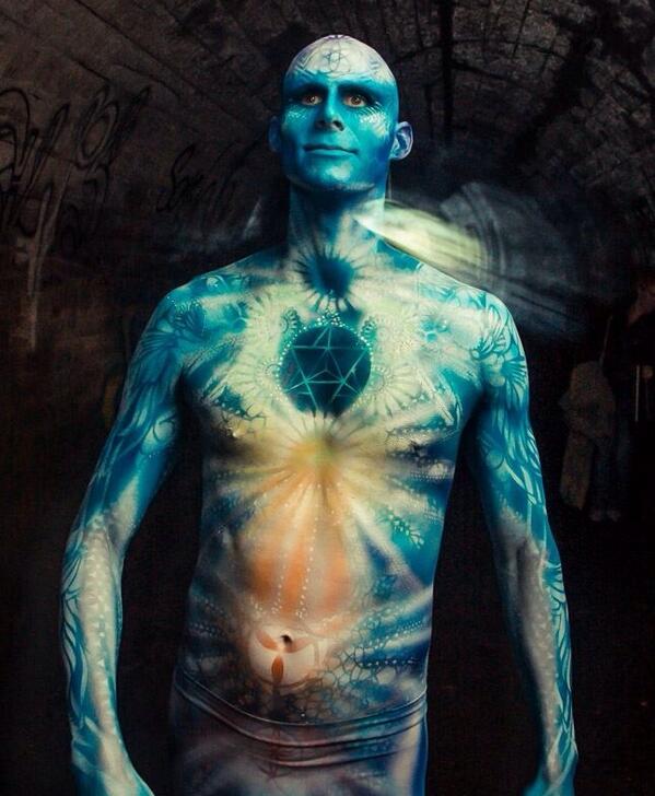 A photo from Dodd's Eye Media.. Dancer Kyle TooTall Strauts painted with sacred geometry &amp; chakra inspired bodypaint