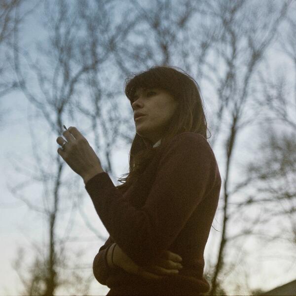 Here's Sarah-Jane, pre-rehearsal smokin' while the sun sets, Nashville TN, on our way to SXSW back in March.