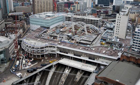 First glimpse of #Birmingham New Street Station's central atrium, from top of the Rotunda: bit.ly/1mYj0cw