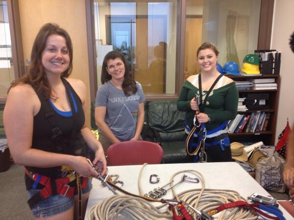 USF_Karst's tweet photo. It's not thundering inside! Sara (l) and Melody (r) #learn the basics of vertical #caving gear from Jackie (c). http://t.co/yJOgbPEHqx