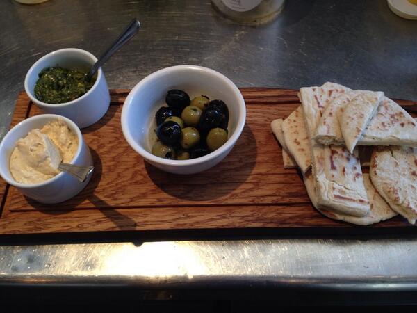 cafe_collective's tweet photo. Homemade pesto, hummus, olives and pitta...the perfect lunch for a sunny day! http://t.co/J3or4extcw