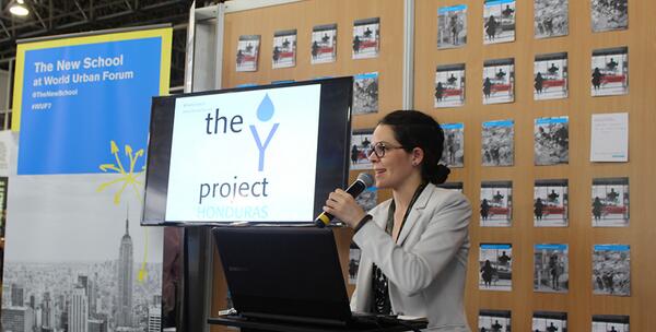 UrbanTNS's tweet image. Parsons student @cmhandalg speaking to packed audience at #WUF7 on success of @TNSNewChallenge project @TheYProjects