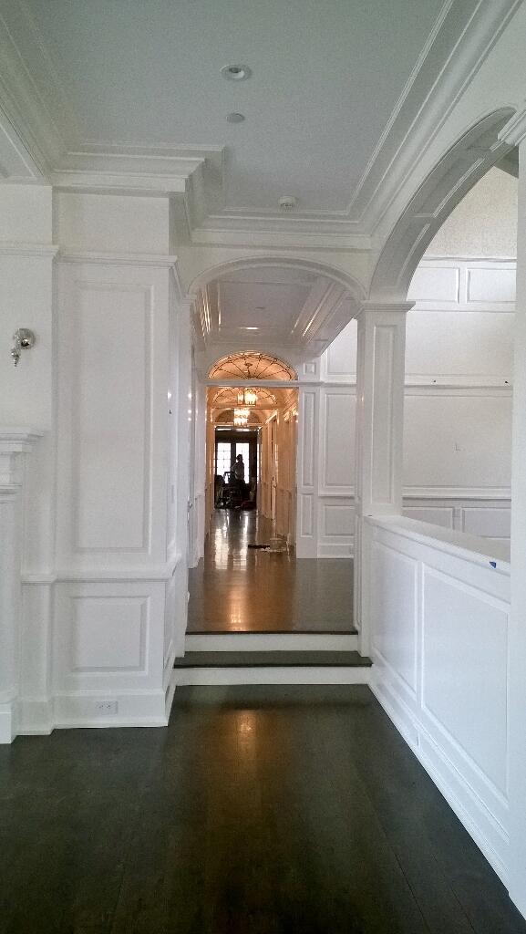 SeanBorstel's tweet image. Foyer - Main Hall looking good with final paint finish and leaded glass transoms #raised panels #pilasters