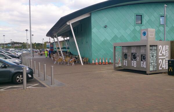 RevolutionWash's tweet photo. New installation of #Revolutionwash 24/7 outdoor self-service launderette at #ExtraServices #Cobham #M25, Jction 9/10 http://t.co/At8Zf5GjsH