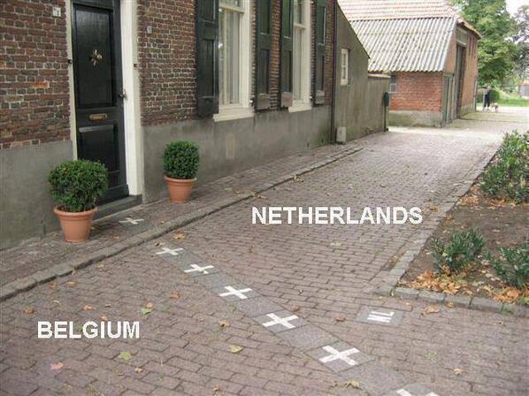 TriviaManiaPH's tweet photo. The Border between Netherlands and Belgium. http://t.co/U7p5VshElN