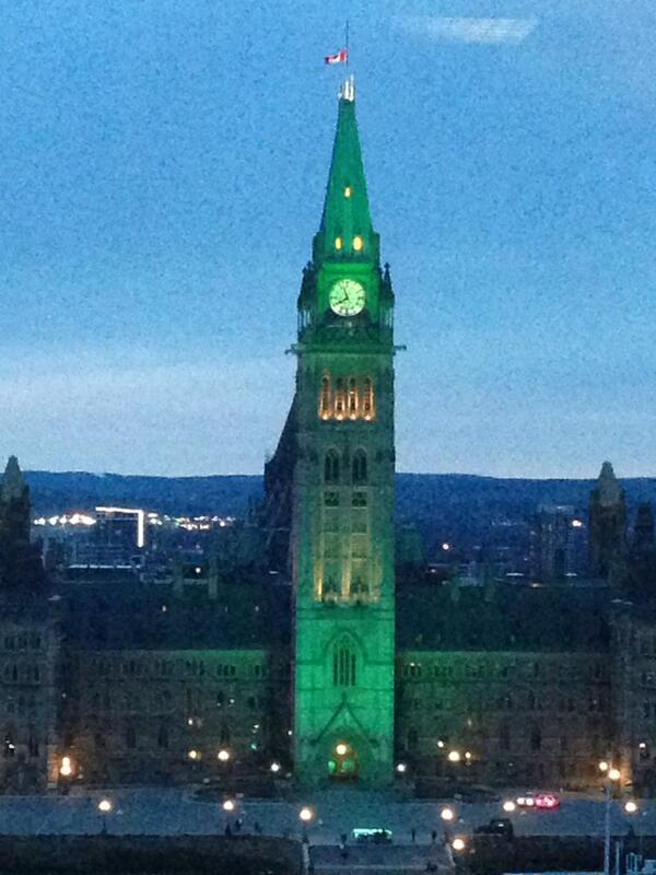 jkenney's tweet photo. Wow. That's wonderful. "@RichardMadan: Peace Tower lit up green to honor late finance minister Jim Flaherty #cdnpoli http://t.co/VYgrxEe5LT"
