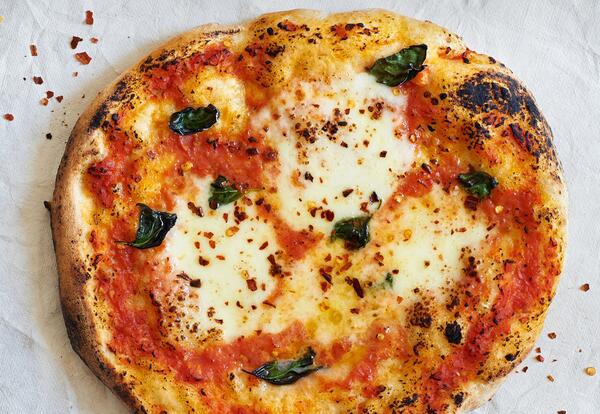 nytcooking's tweet photo. Margherita pizza, a snap to make in your own kitchen: http://t.co/P9130ao1La Photo: Melina Hammer for NYT http://t.co/LXgQ8OPQh7