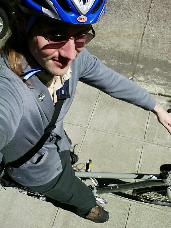 lostluck's tweet photo. Grey cardigan, tan shirt, blacktint green dungarees. A bike. And a @TCFcomic Bee Pin! http://t.co/EwTCzL425h
