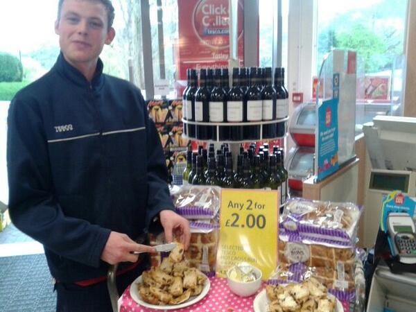 Nom nom nom <a href="/Tom_Smith__/">Tom Smith</a> buttering up mountains of taster size hot cross buns!