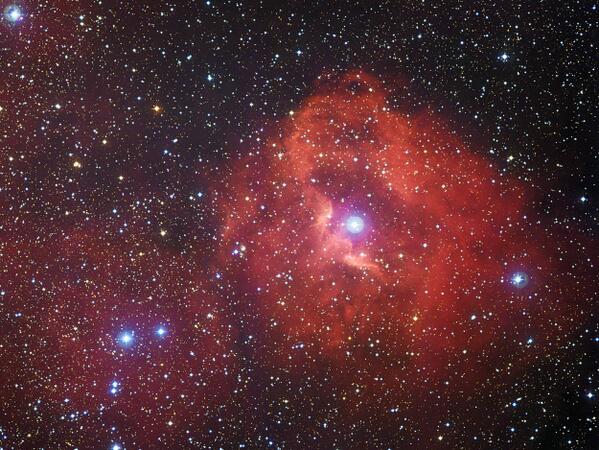 WIREDScience's tweet image. RT @wiredspacephoto Young stars power nebula's red glow wrd.cm/1nheOHA