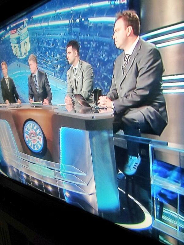 Wont mention any names but looks like someone on HNIC forgot his shoes today
..thats not playoff mode! Lol