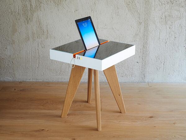 Studio Natural has created "Lucio" a recharging table that uses artificial and natural light. bit.ly/1hB01zu
