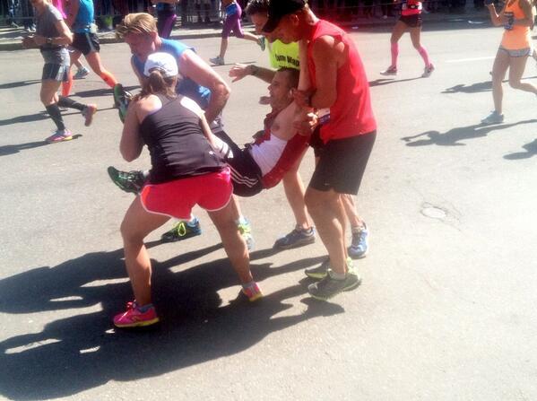 mashable's tweet image. #BostonMarathon runners carried a collapsed racer across the finish line today. on.mash.to/1i9iJyx