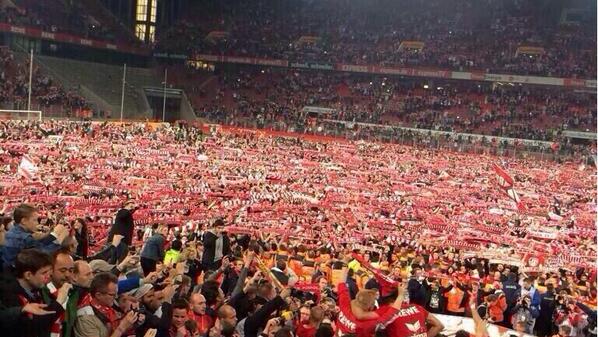 AwayDays_'s tweet photo. Cologne have just been promoted to the Bundesliga. How about this for a pitch invasion. http://t.co/6tQK61PbXR
