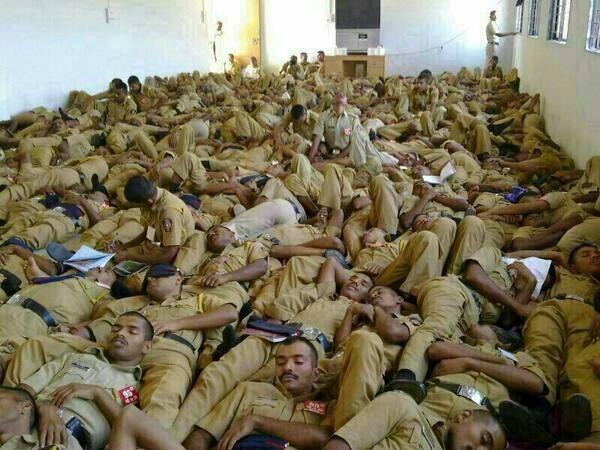 anooppr's tweet image. @KatieMagnet Cops on election duty taking rest.Sad about their lifes #India #RespectCops