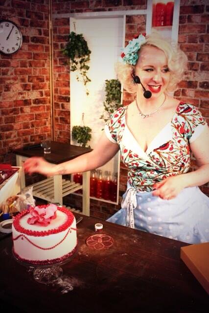 restorationcake's tweet photo. Rocking a head full of flowers by @LMischief @TheHappyApronCo apron and dress by Vanity Project Limb. Baking attire! http://t.co/G50jRSNSGL