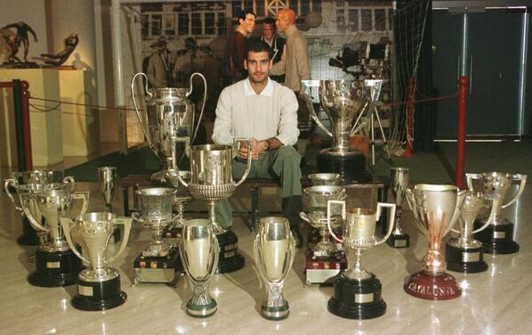 Oh nothing, just Pep Guardiola posing with trophies earned as a player for  FC Barcelona.