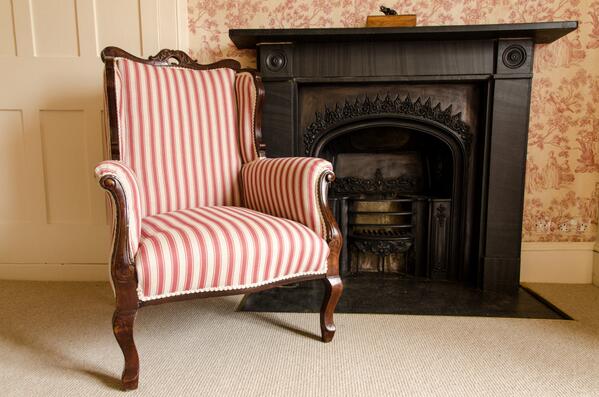 One of our lovely ornate Arm Chairs covered in @Warwick_Fabrics 'Cornwall Ticking' range #antique #edwardianchair