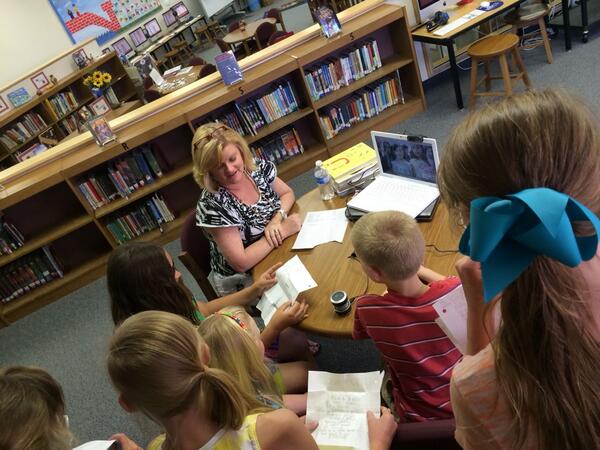 FambroughSusan's tweet photo. Our SRE students on Skype w/ Faubion students, sharing "poem in your pocket!" Thanks Lisa Hawkins, BEST librarian! http://t.co/r8b87WIEbm