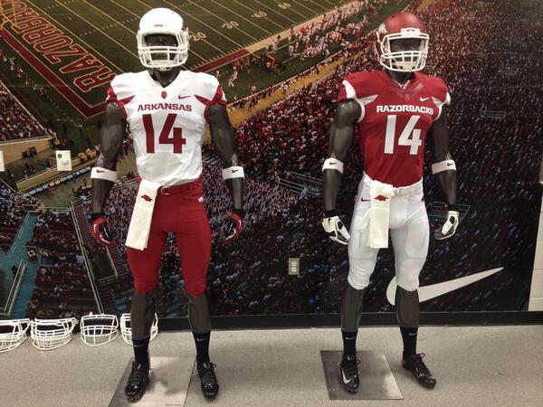 RazorbackFB's tweet photo. See our 2014 uniforms tomorrow at Hog Heaven in #DWRRS south concourse starting at 10a #WPS http://t.co/eqkilKxrVP