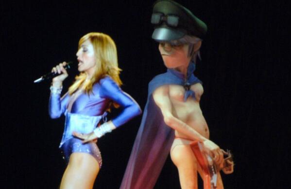 RecordingAcad's tweet photo. #Flashback: @Madonna + @gorillazband perform "Hung Up" at the 48th #GRAMMYs in 2006 http://t.co/bxNpvugUtD http://t.co/uwc6TFTU0g