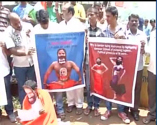HasibaAmin's tweet photo. ''@ANI_news : Bangalore : Protest against Baba Ramdev for his comments on Dalit women http://t.co/8EegafhHZ4" #AntiDalitRamdev