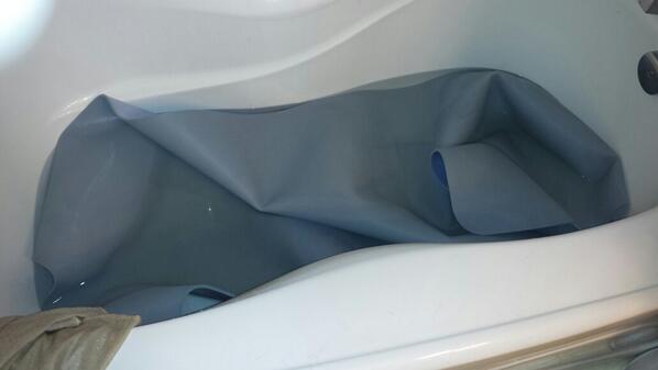 b_thou's tweet photo. Yoga mat bath time in preparation for the #joga workshop tomorrow! #sweatydeath @ZenZoneBrandon http://t.co/4qe5IWOfJt