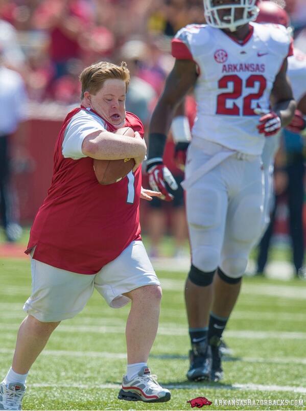 SBNation's tweet photo. Arkansas superfan Canaan Sandy scored a TD in the spring game today: http://t.co/Fc9v0ycUt6 (pic: @RazorbackFB) http://t.co/gCeGTQ0F3a