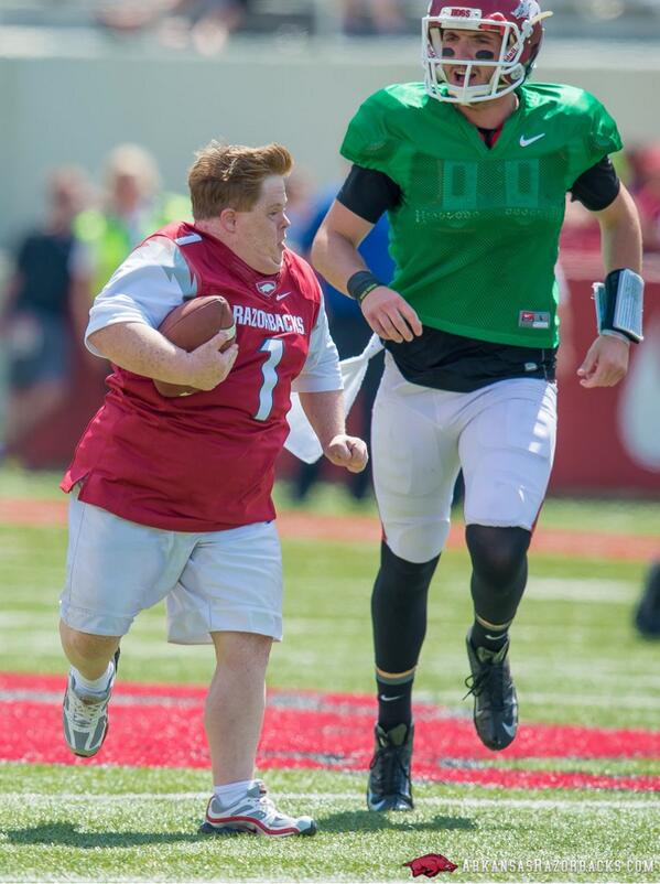 SBNation's tweet photo. Arkansas superfan Canaan Sandy scored a TD in the spring game today: http://t.co/Fc9v0ycUt6 (pic: @RazorbackFB) http://t.co/gCeGTQ0F3a